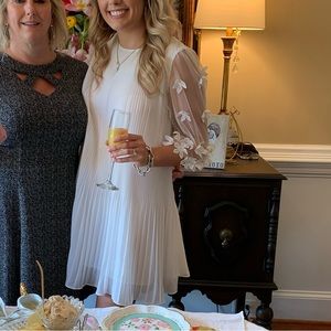 The Clothing Company white flutter dress